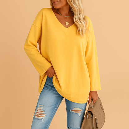 Women’s lightweight summer top with round neckline and short sleeves in various colors, ideal for warm days and casual summer looks.