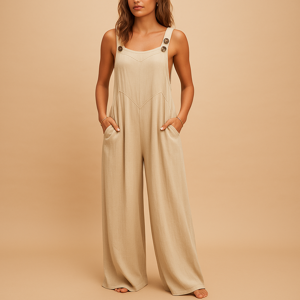 Woman wearing a high-waist wide-leg summer jumpsuit with button details and side pockets, perfect for warm casual days.