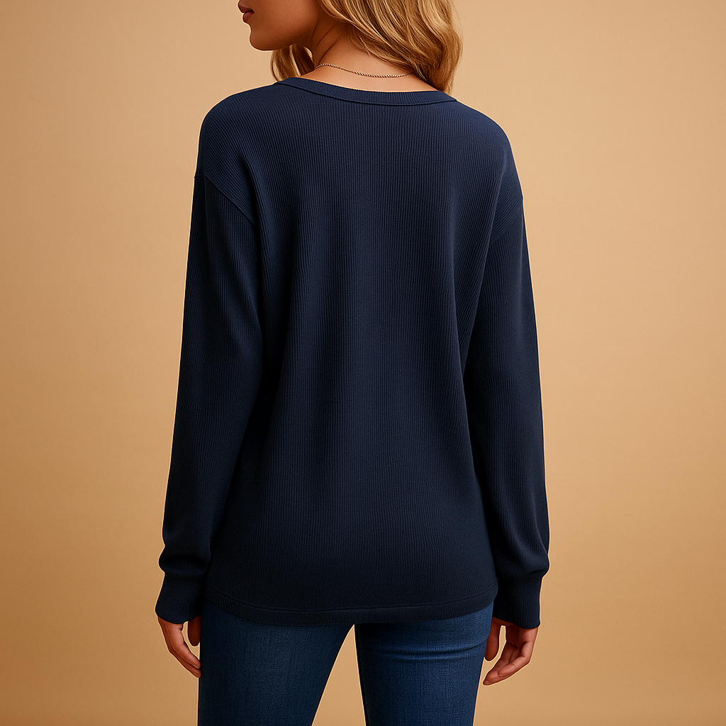 Women’s v-neck blouse with button details and a loose, comfortable fit, suitable for daily wear, office outfits, and versatile styling.