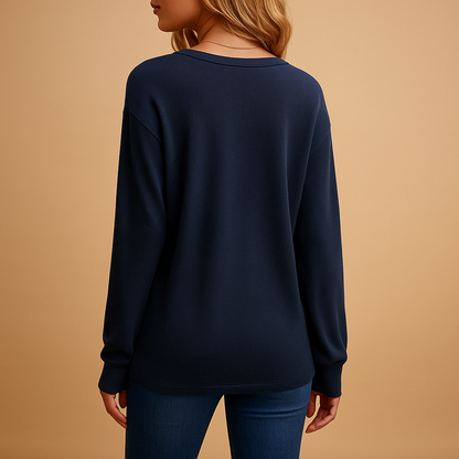 Women’s v-neck blouse with button details and a loose, comfortable fit, suitable for daily wear, office outfits, and versatile styling.