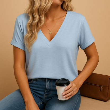 Women’s v-neck blouse with short puff sleeves, lightweight and breathable, ideal for work, casual wear, and warm everyday occasions.